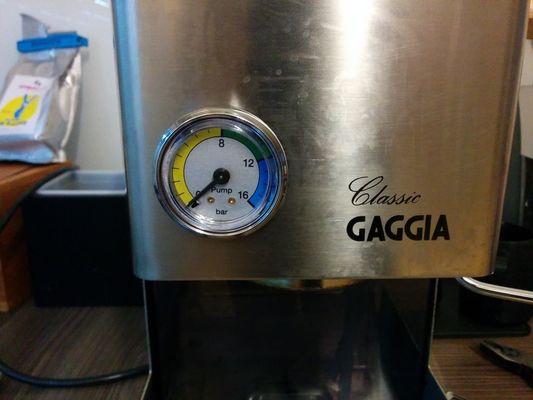 The manometer build into the espresso machine. For that, the Gaggia logo had to be removed